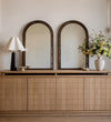 Como Arch in Aged Brass & Basalt Leather Wall Mirrors
