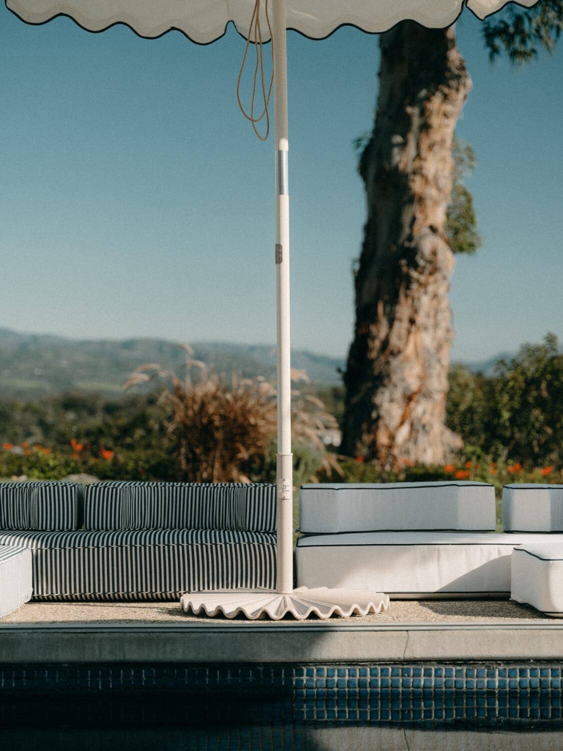 The Clamshell Base - 55 lbs - Antique White Outdoor Umbrellas